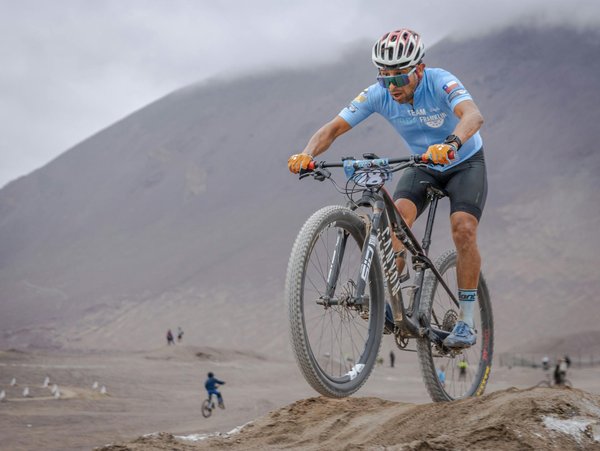 What are the impacts of grassroots football on UK communities?